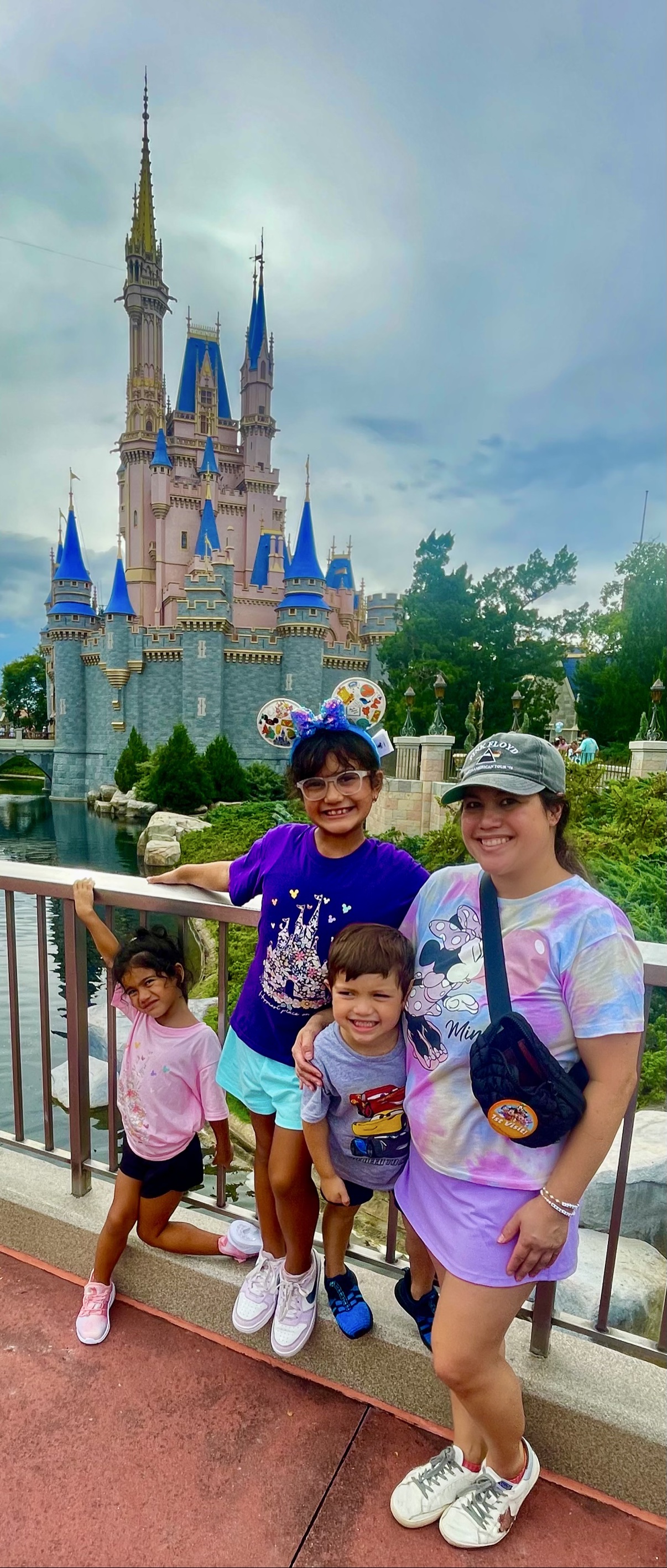 Fatima's family at the Disney castle