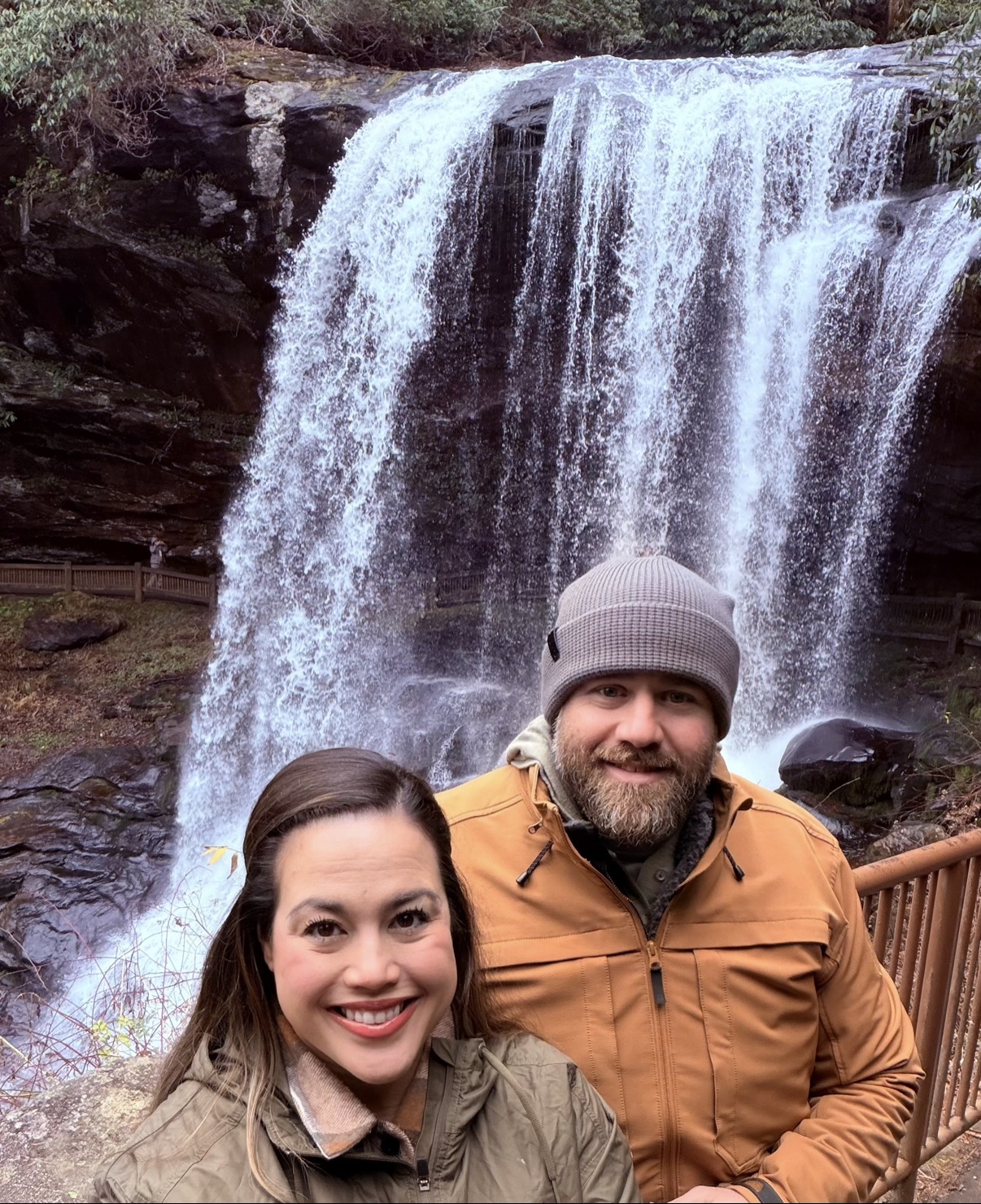 Fatima and her partner at a waterfall