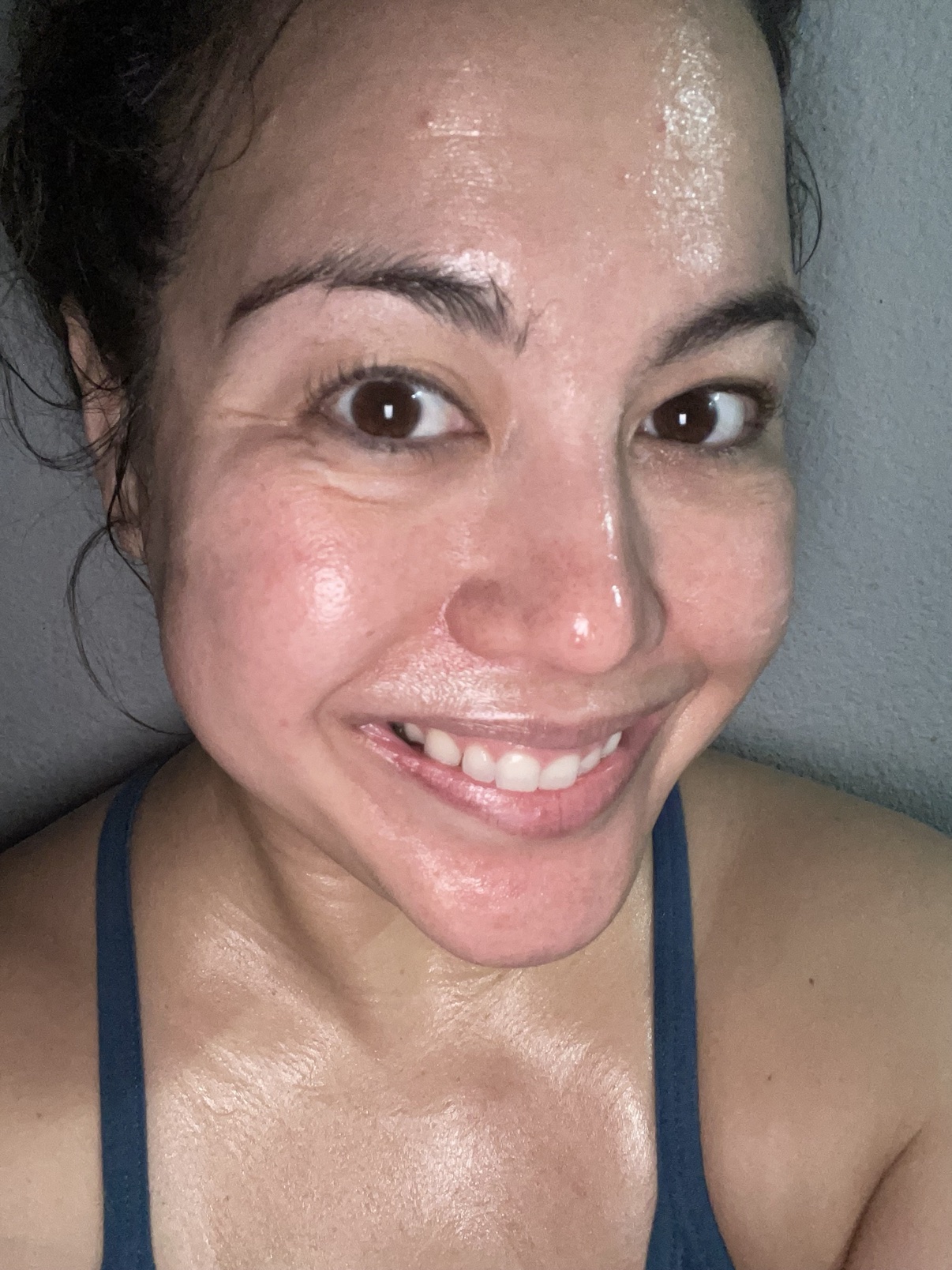 Fatima in a natural no-makeup post-workout close-up
